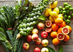 a group of fruits and vegetables on a wood surface Healthy Weight Loss Diets Harwich